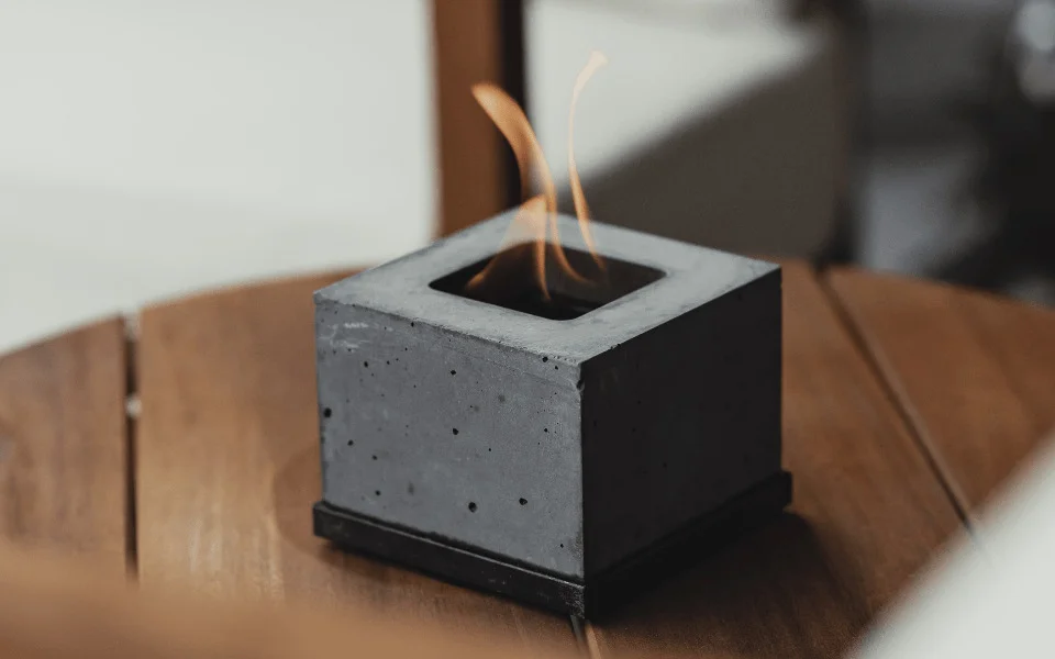 FLIKR Personal Fireplace with rubbing alcohol for cozy winter warmth