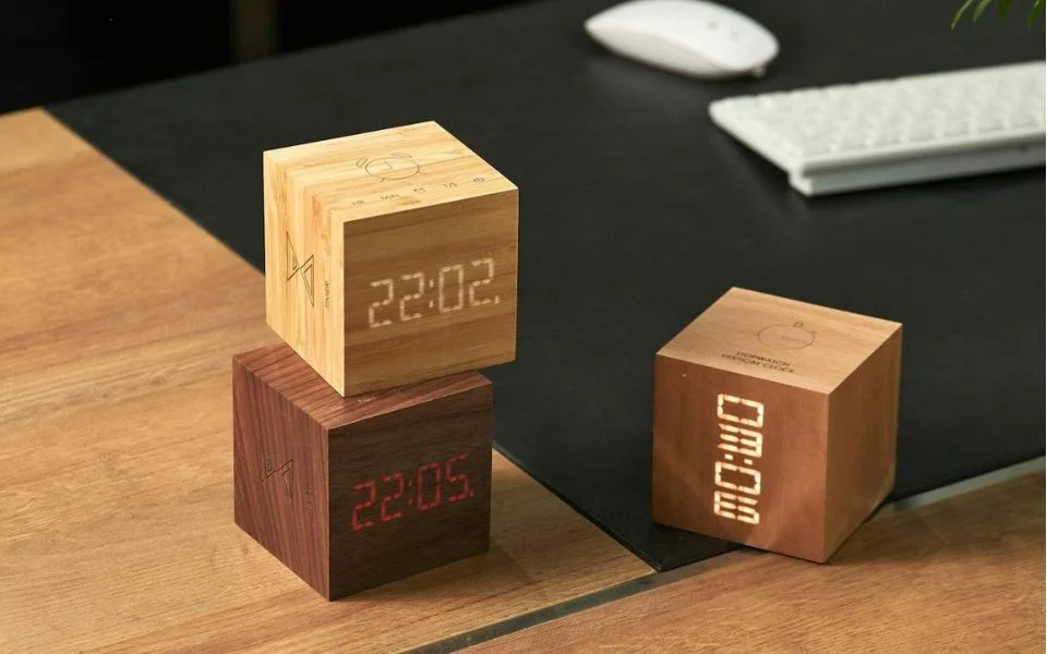 Gingko Cube Plus Clock in walnut, bamboo, cherry as statement piece