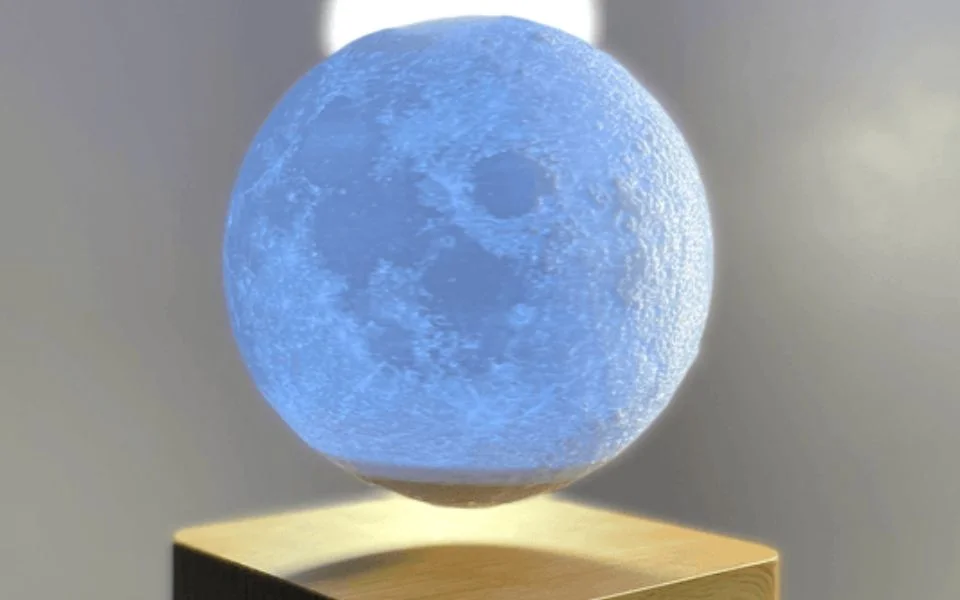 The moon levitates, lights up, and charges simultaneously